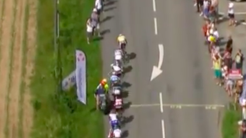 Cyclists crash into course motorcycle during race